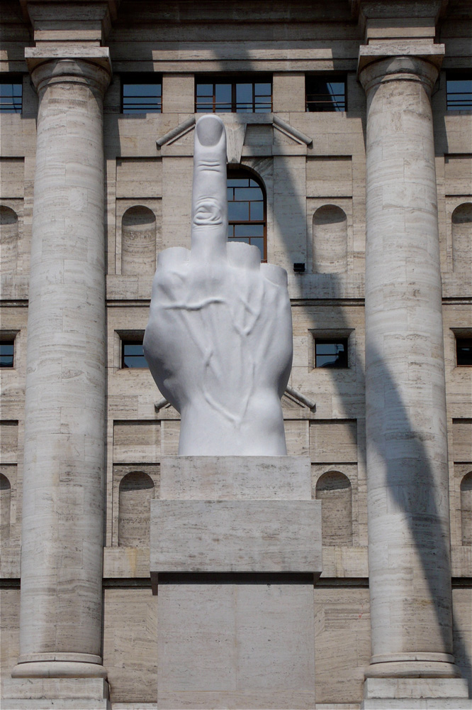 Sculpture by Maurizio Cattelan. Placed in front of Milan’s Stock Exchange
